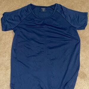 ATHLETA. Medium size Athleta short sleeve with perforations, navy, gently used